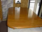  Formica top table that was scratched and crazed.