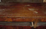 An antique sideboard topcloseup before repairs.