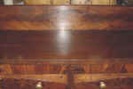 An antique sideboard top closeup after repairs.