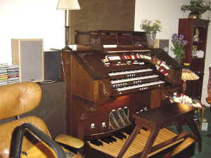 The matching bench and organ in the owners home.
